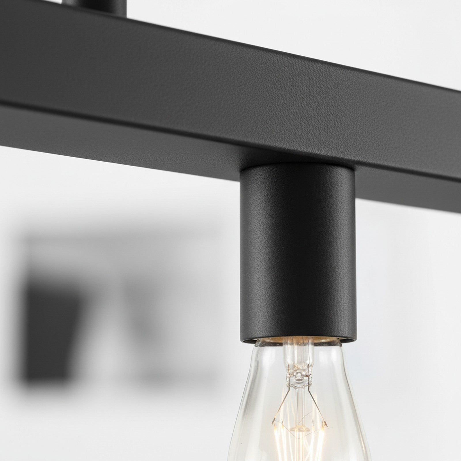 Linear Kitchen Island Pendant - close-up of matte black finish and socket detail