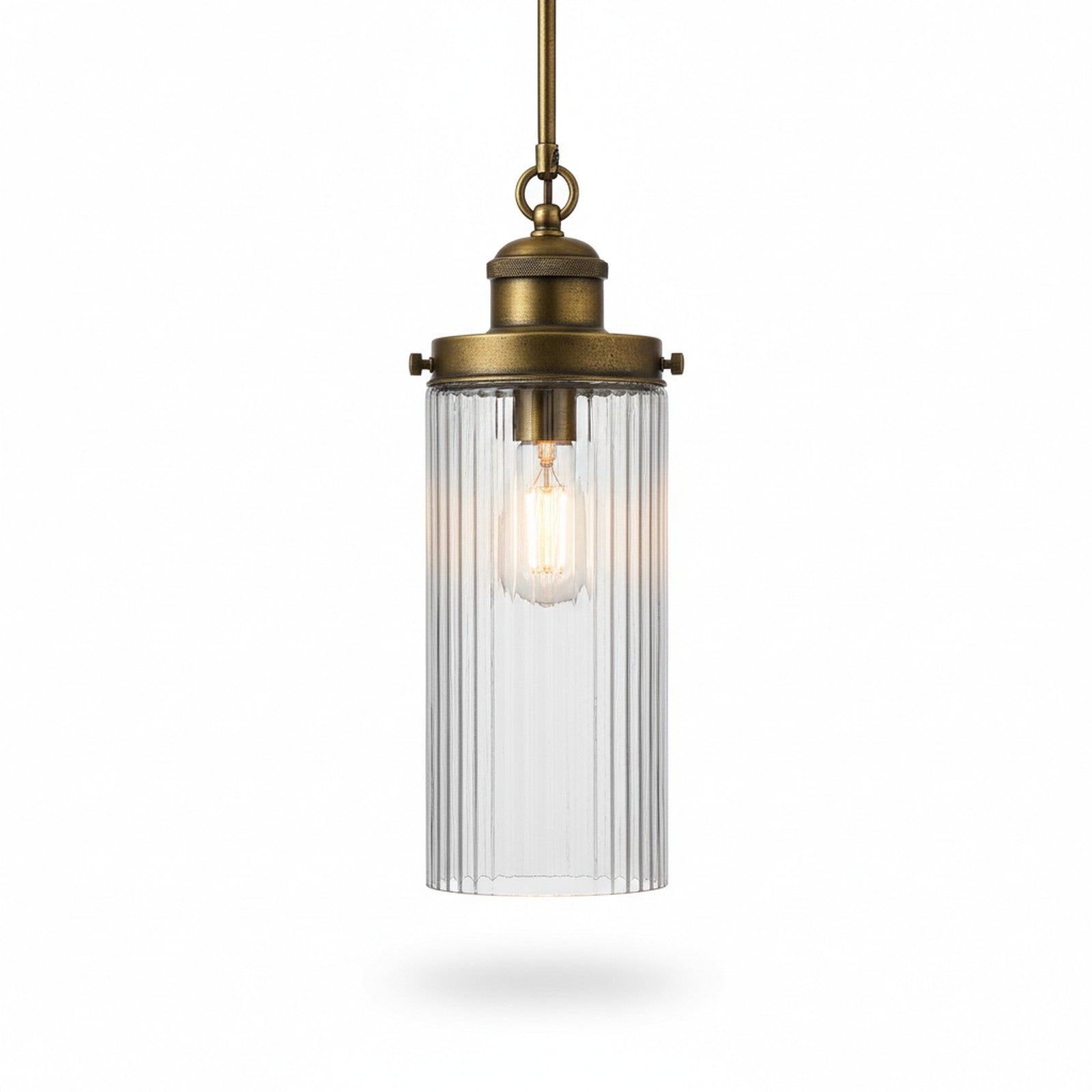 Ribbed Glass Cylinder Pendant - fluted glass with aged brass hardware on white background