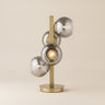 Brass Four-Light Table Lamp with Silver Globe Shades