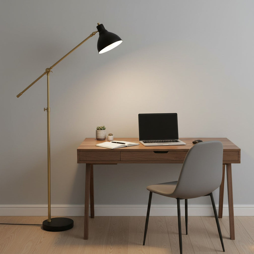 Brass arched floor lamp providing focused task lighting in modern home office